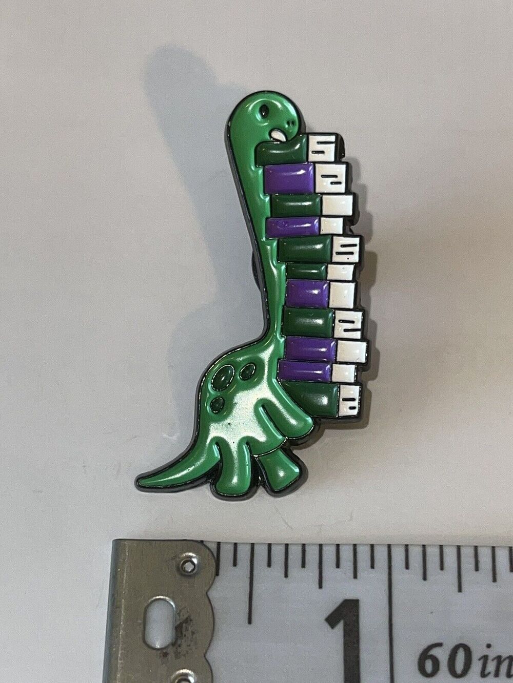 Dinosaur With Books Pin Brooch